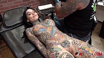 Busty tattooed chick gets a new tattoo on her face